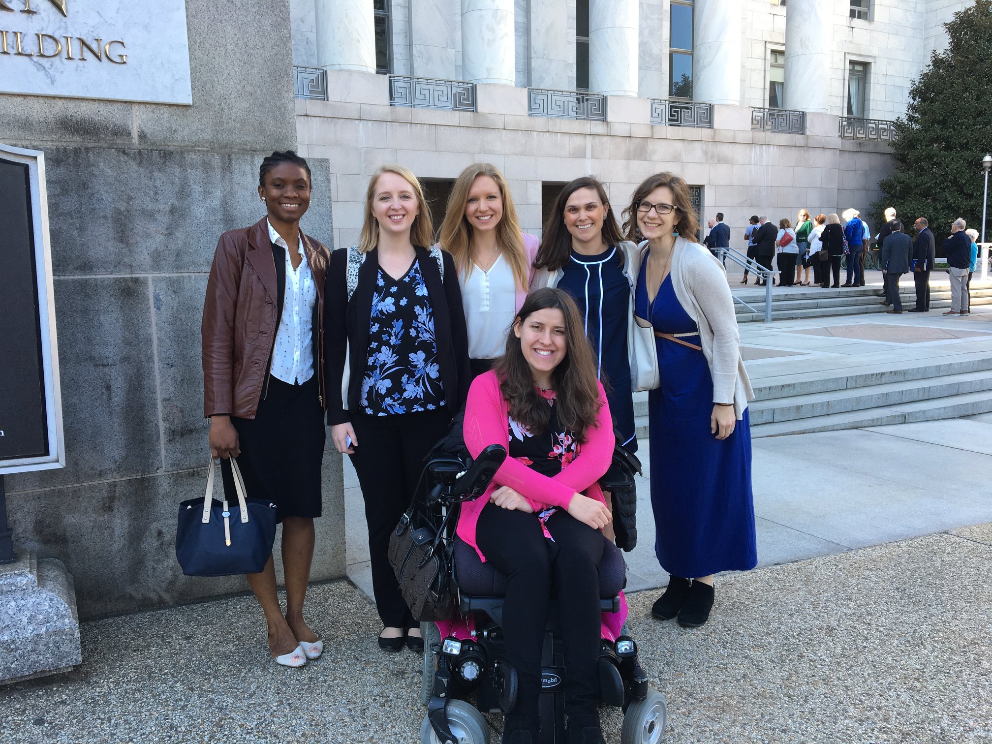 five trainees and assistant director in photo on capital hill